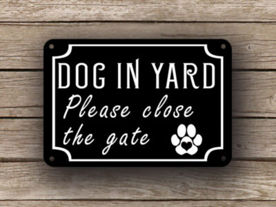 Black Dog In Yard Sign