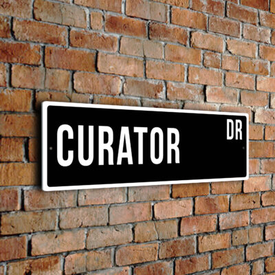 Curator street sign