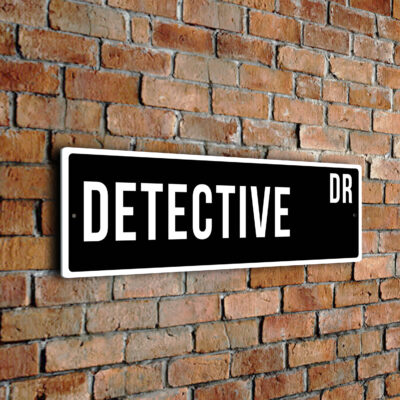 Detective street sign